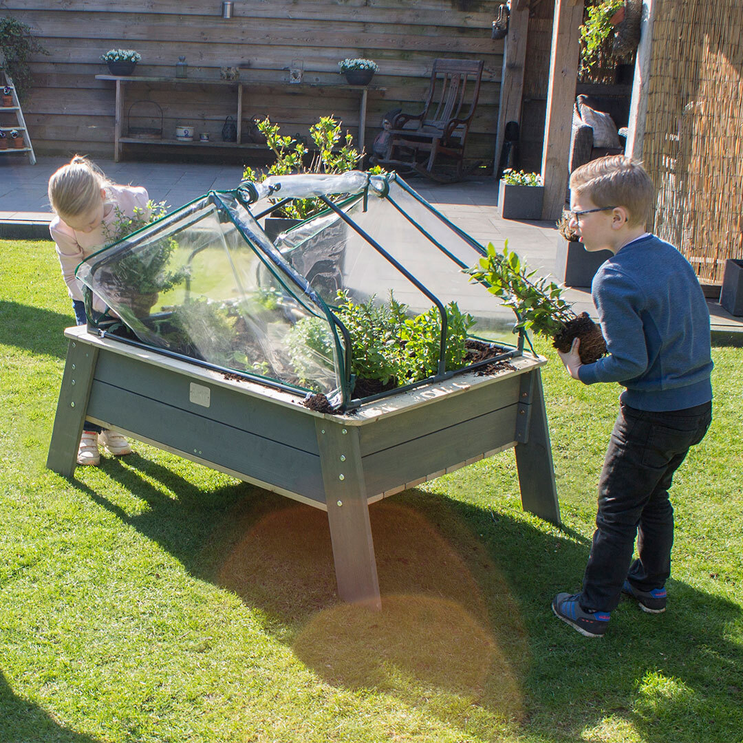 Playing outside in a small garden with EXIT Toys EXIT Toys