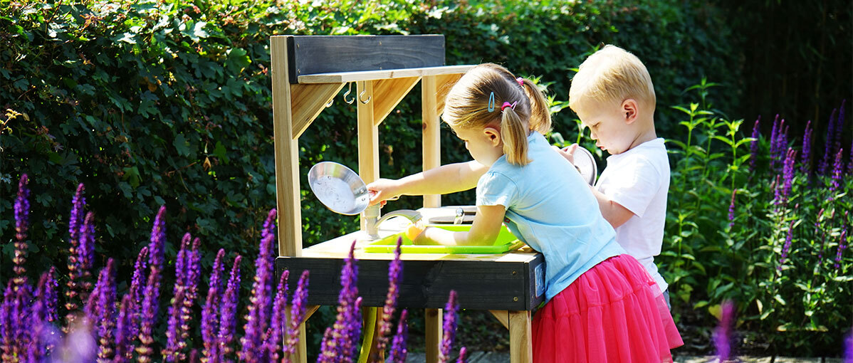 Cooking with whatever nature has to offer in an outdoor play kitchen