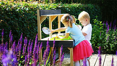 Cooking with whatever nature has to offer in an outdoor play kitchen
